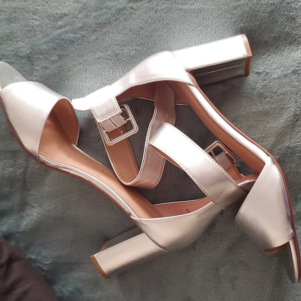 Strapped silver shoes